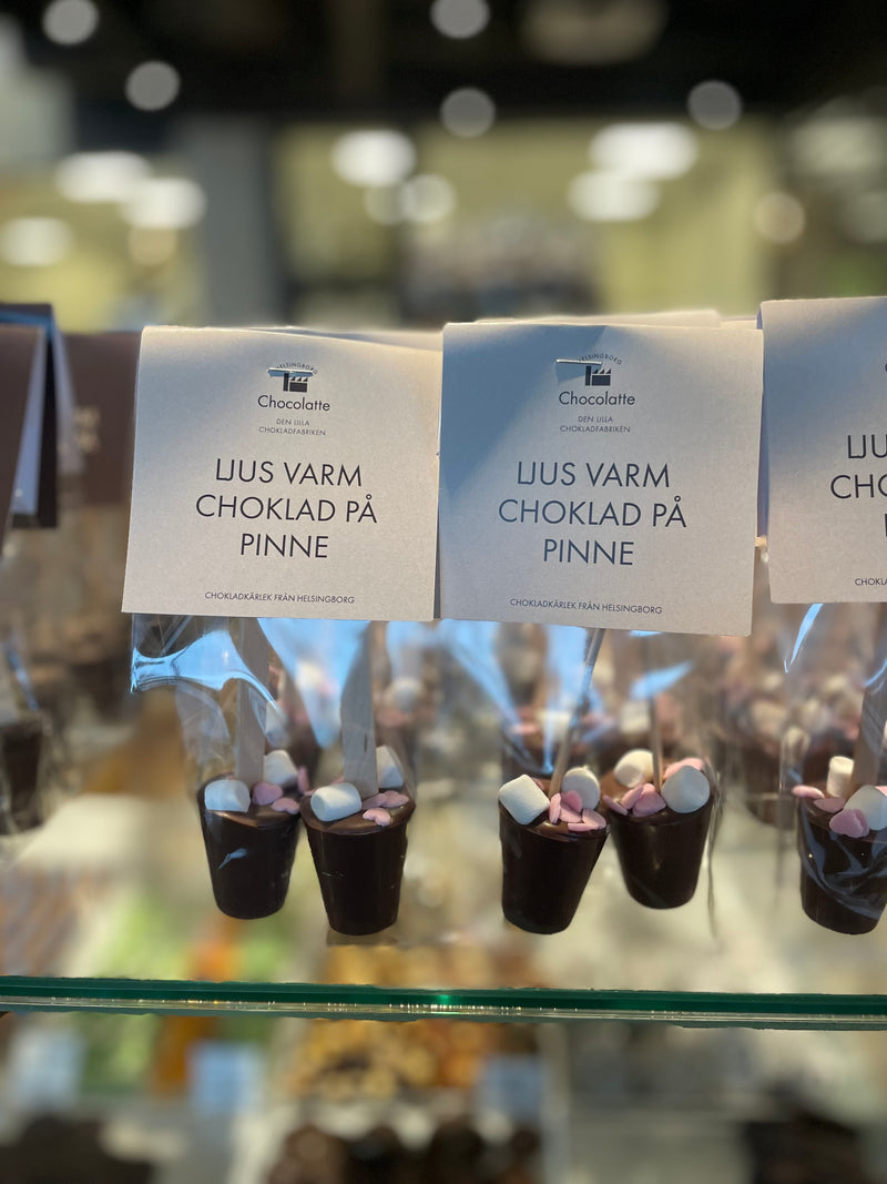 Varm choklad på pinne i mjölkchoklad - Chocolatte Helsingborg