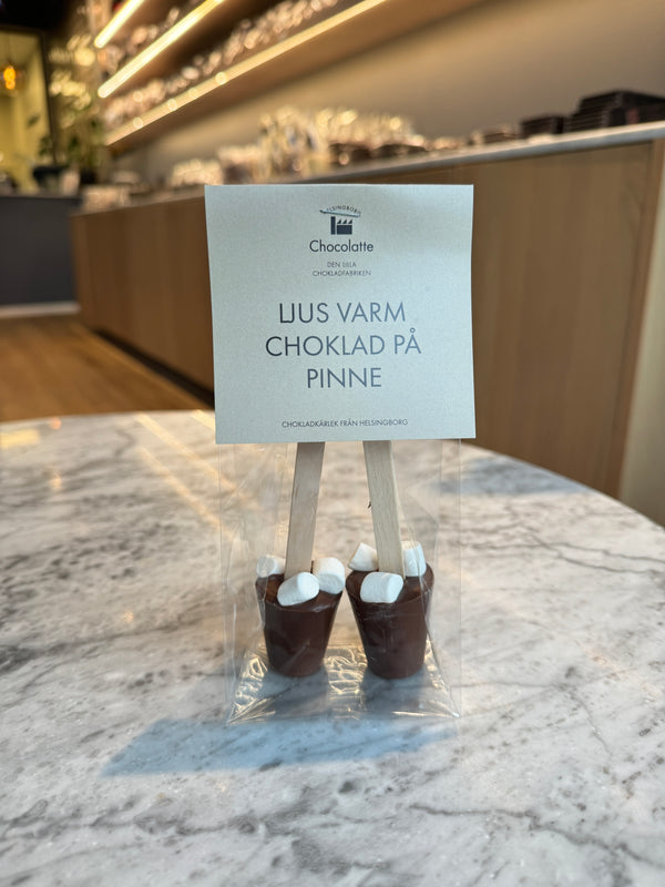 Varm choklad på pinne i mjölkchoklad